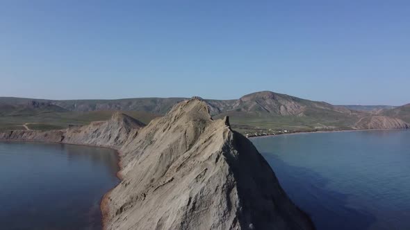 Drone aerial coastal cliffs and rocks