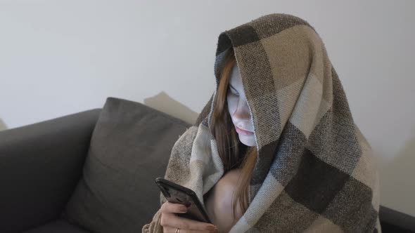 Beautiful Redhaired Woman is Bored at Home During Quarantine alt