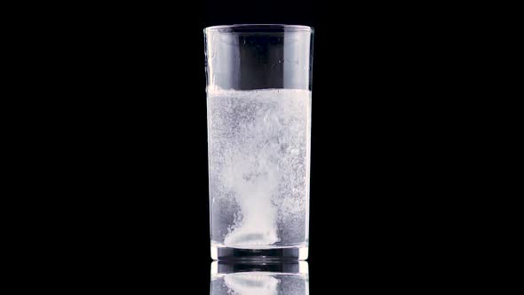 Effervescent Antacid Tablet In Glass Of Water