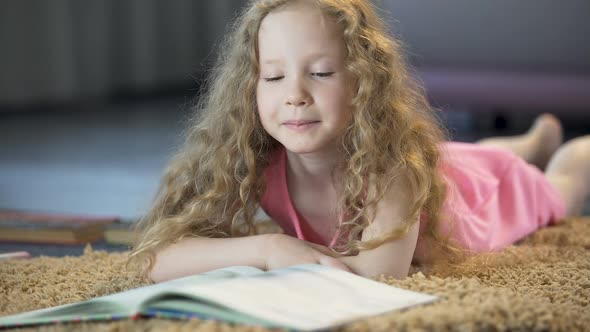 Smart Young Girl Turning Book Pages, Reading Interesting Literature, Education alt