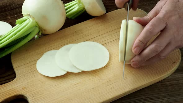 Sliced daikon radish.Tasty fresh crude white round japanese radish.