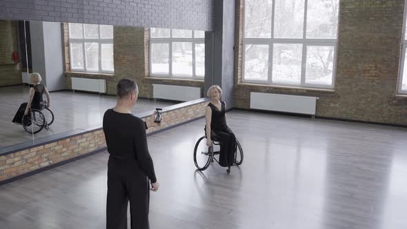 Handicapped Woman on Wheelchair Dancing on Camera alt