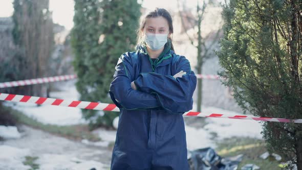 Medium Shot Portrait of Serious Confident Woman in Forensics Uniform Crossing Hands Looking at alt