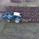 Tractor Plowing the Garden. Plowing the Soil in the Field - VideoHive Item for Sale