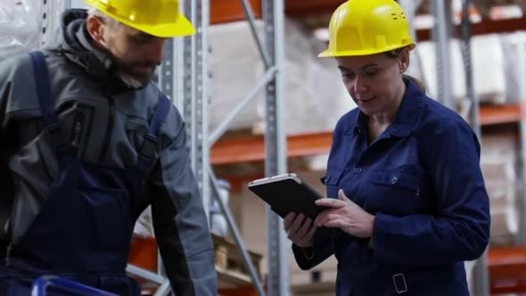 Workers Stock-Taking in Warehouse alt