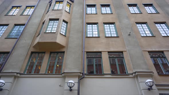 Apartment Buildings on European Streets in Old City. Scandinavian Windows.  alt