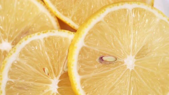 lemon close-up. rotating lemon slices close-up slow mo