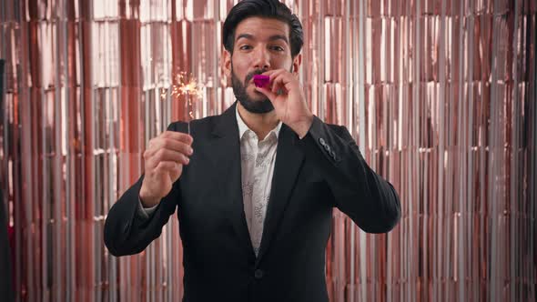 Handsome Seductive Confident Bearded Cuban Entrepreneur Man in Black Suit Blowing Party Horn and alt