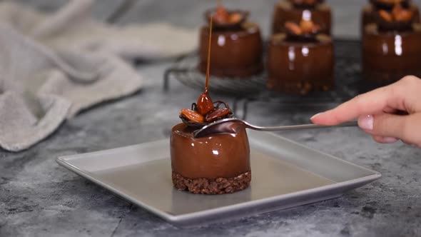 Mini Mousse Pastry Dessert Covered with Chocolate Mirror Glaze