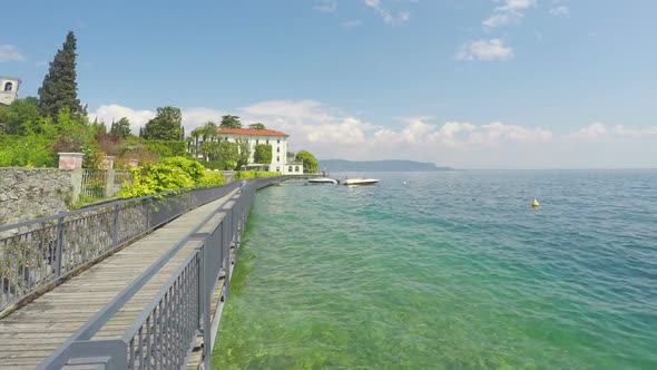 Two Moored Speedboats at Seafront on Sunny Day, Summer Weekend, Timelapse alt