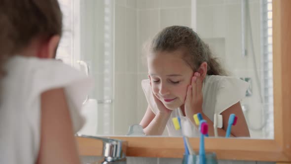 Portrait Happy Cute Young Teenage Girl Washes His Face in Bathroom and Smiling alt