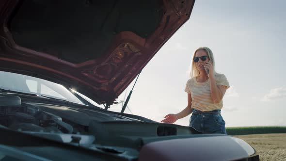 Video of woman calling for assistance on the road.  Shot with RED helium camera in 8K alt