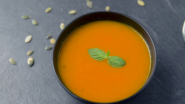Close Up of Vegetable Pumpkin Cream Soup in Bowl 7 alt