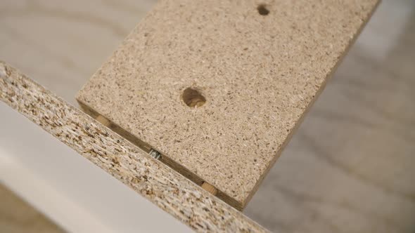 Assembling Furniture with Using Tools alt