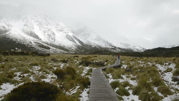 Curvy Hanging Pathway Protects Mountain Ecosystem at Hooker Valley Track alt