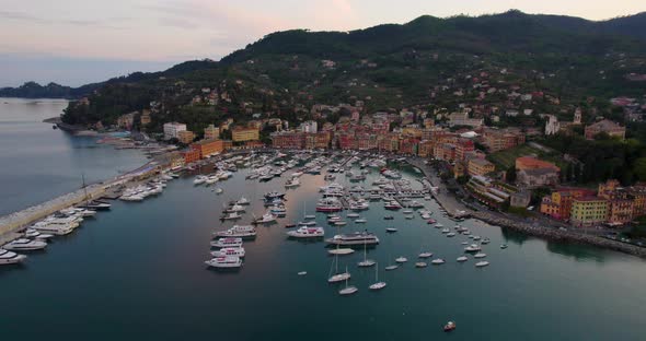 Boats in Portofino Harbor on Beautiful Evening on the Italy Coast - Aerial alt