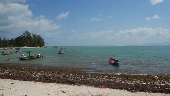 Plastic Trash on the Coast After High Tide