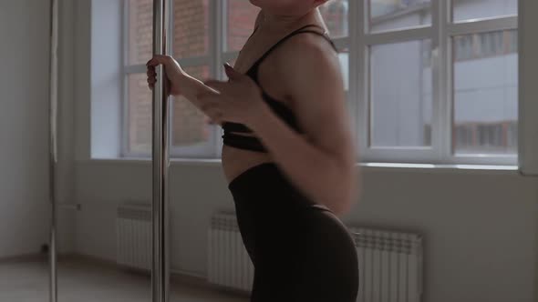 Fit Woman Dancing Erotic Dance in Studio alt