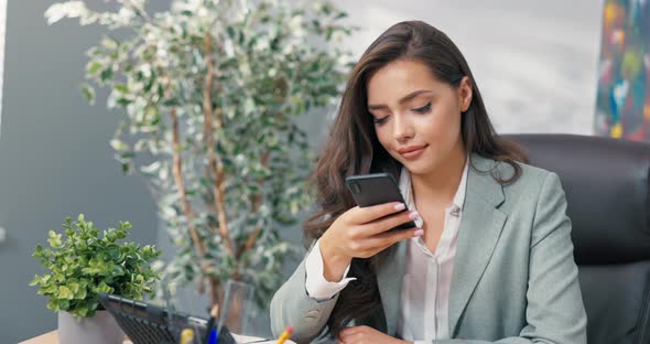 Specialist in Running Social Media Marketing Customer Communications Sits in Company Office at Desk alt