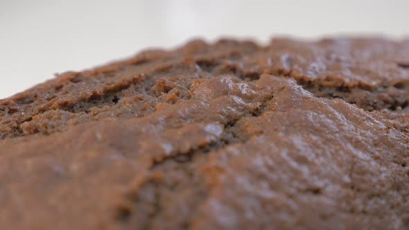 Tasty chocolate cake texture slow  panning 4K 2160p UltraHD footage - Chocolate cake surface cracked alt