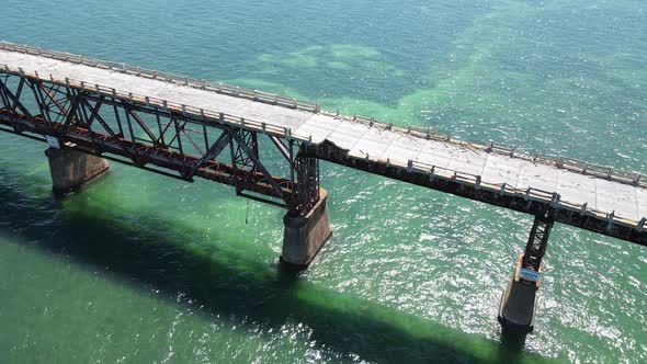 Gorgeous orbiting aerial of the old Bahia Honda Railroad Bridge in the Florida Keys, Florida, USA. C alt