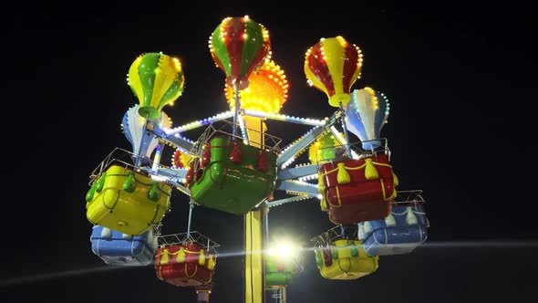 Joyful And Colorful Amusement Park At Night 11