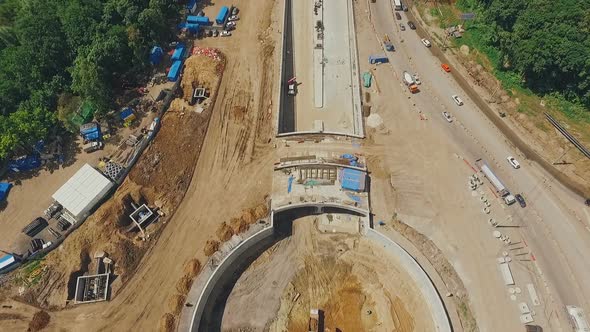 Aerial Shot of Construction of Traffic Circle in Sunny Summer Day, Camera Motion From Down To Up