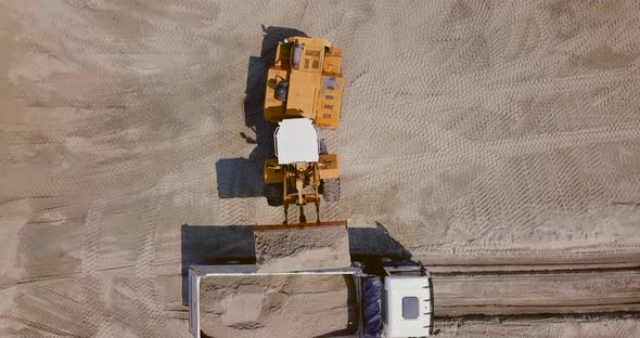 The Work of Loading Equipment in the Sand Quarry