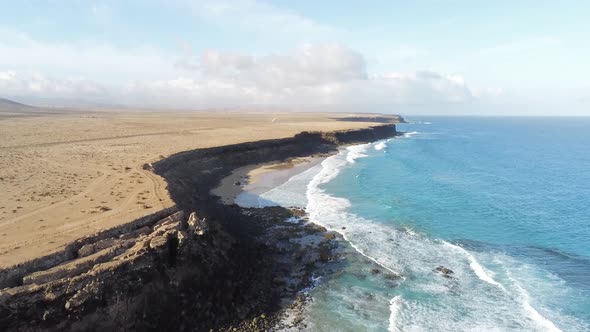 Aerial Footage of Sea Waves on a Rocky Cliffed Coast