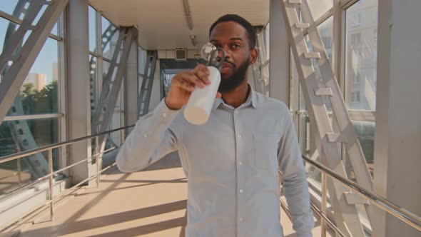 Afro American Business Man Boss Leader Wears Formal Shirt Walking Down Corridor with Panoramic alt