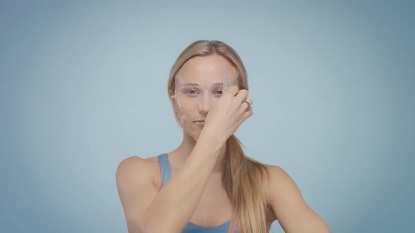 Blonde Model During Facial Treatment Routine