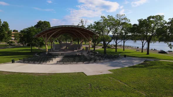 Newly renovated outdoor theater in city park on the edge of the Mississippi River in summer.