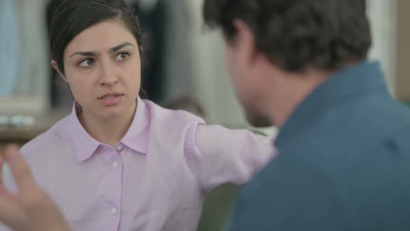Indian Woman Talking to Young Man on Sofa, Stock Footage | VideoHive