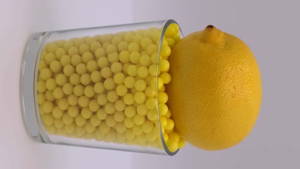 Vertical orientation video: Vitamin C to improve immunity. Ascorbic acid and lemon