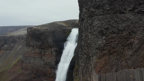 Drone View of Basalt Rock Formation Revealing Haifoss Waterfall in Southern Iceland alt
