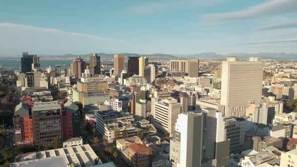 Urban Cityscape With High Buildings And Lake