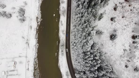 Aerial shot over a road in the winter