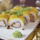 The camera circles around the sushi set on a white clay plate - VideoHive Item for Sale