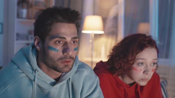 Male Fan Excited about Team Winning alt