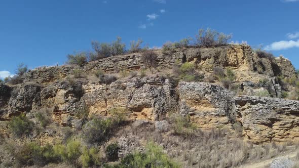 Dolly shot through Cueva de la Batida, historic ancient rock quarry alt