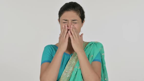 Indian Woman Looking at the Camera Sad Expression White Background alt