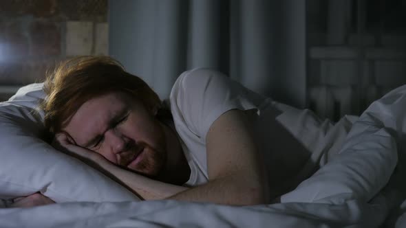 Uncomfortable Redhead Beard Man Sleeping in Bed at Night Restlessness alt