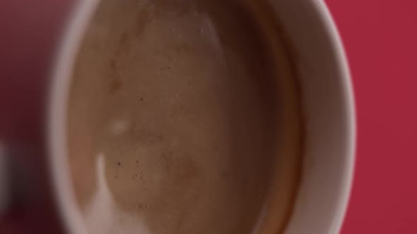 Vertical video: Milk coffee texture alt