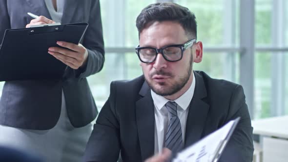 Angry Boss Scolding Employees alt