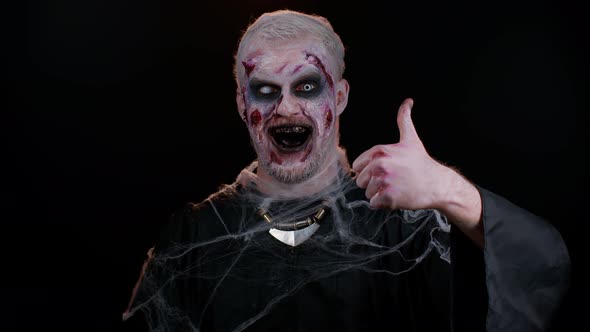Sinister Man Halloween Zombie Raises Thumbs Up Agrees with Something or Gives Positive Reply Likes alt