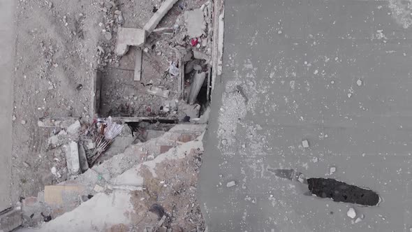 Vertical Video of a Multistorey Building Destroyed During the War in Ukraine alt