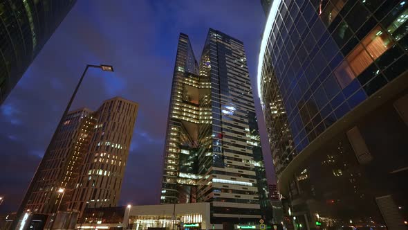 A Huge Business Center of Several Highrise Towers at Night