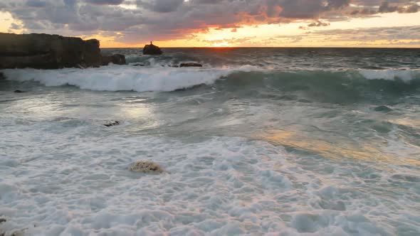 Stormy Sea on the Sunset.