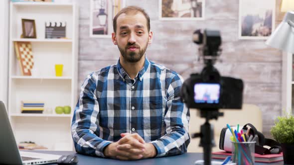 Excited Influencer While Recording for His Vlog in Living Room alt