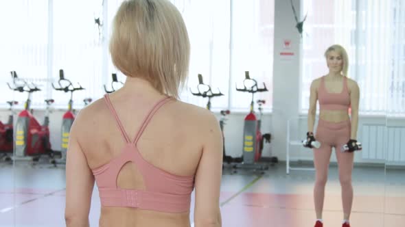 Young woman training in a sports club